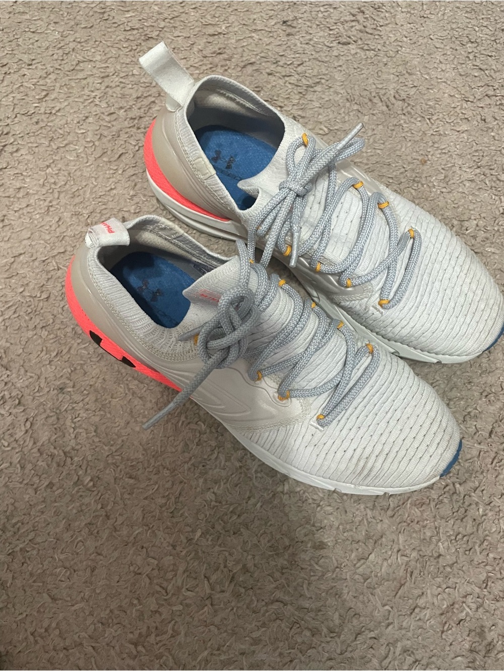 Comfy Under Armour Women's White Athletic Shoes with Pink Accents. Hard to find